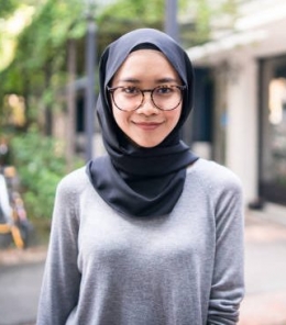 Portrait of a Malaysian girl looking at camera.
